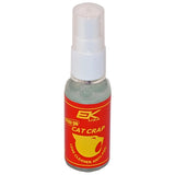 EK USA Cat Crap Spray On is a lens cleaner in a small bottle with a white cap and red-yellow label, designed for effective anti-fog treatment.