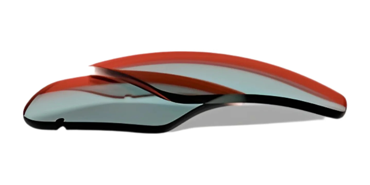 Two curved, translucent RE Ranger Edge Lenses by RE Ranger are stacked on a white background. Two curved, translucent RE Ranger Edge Lenses by RE Ranger are stacked on a white background.