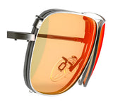 Close-up of RE Ranger Sporter Clip-On Lens with orange tint, reflective RIACT A.I. lens, and metal frame by RE Ranger, highlighting the hinge detail.