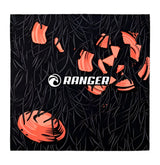 Orange clay targets breaking amid black grass, with "RANGER" in white centered—featuring RE Ranger SuperShot Shooting Glasses with magnetic interchangeable frame or ClaySight lenses for optimal clarity.