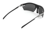 The Rudy Project Rydon Sunglasses by Rudy Project are black wraparound sports shades with dark lenses, shown from the rear on a white background. Adjustable anti-slip nosepads ensure a secure fit during intense activities.
