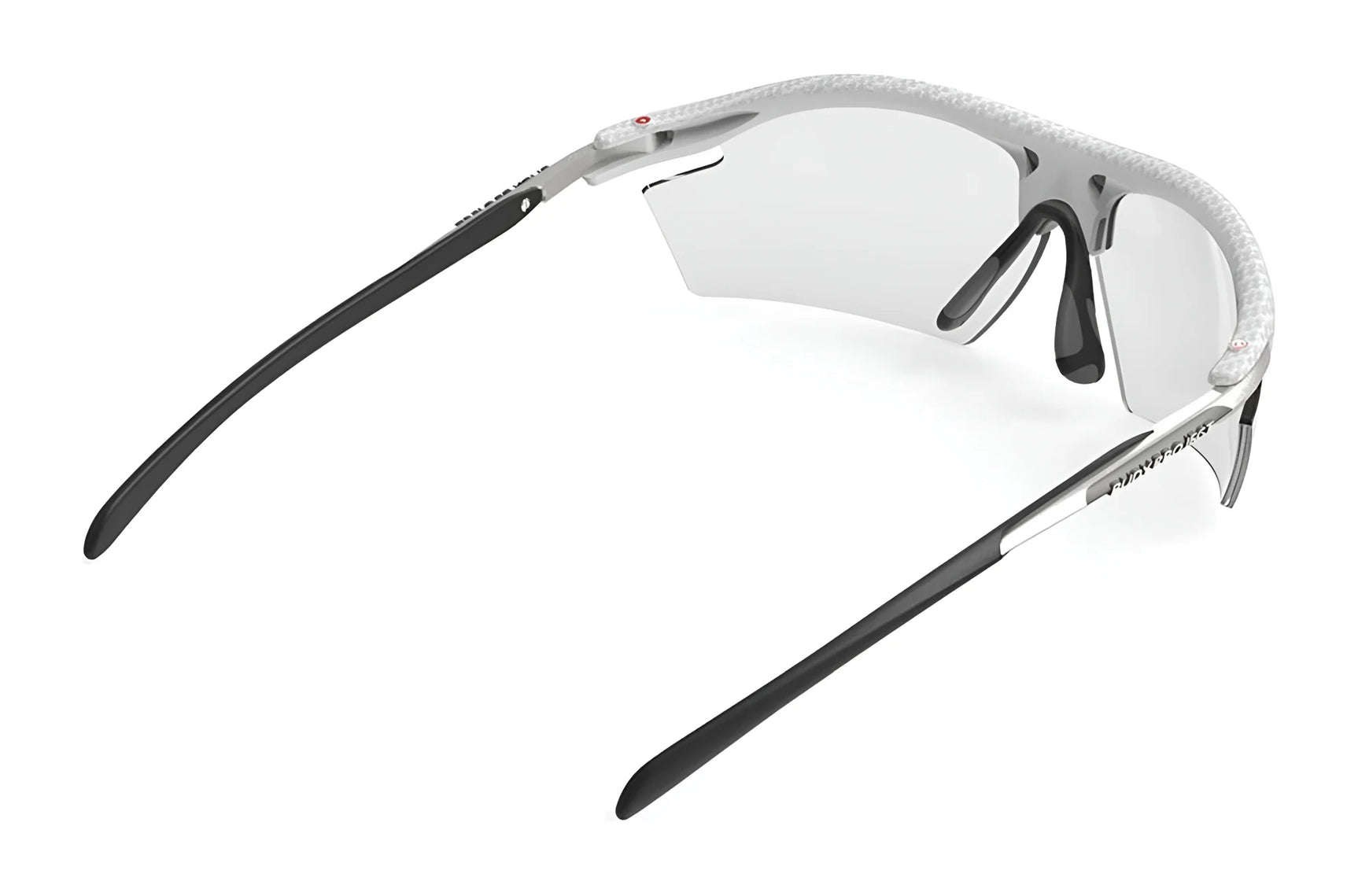 Back view of Rudy Project Rydon Sunglasses by Rudy Project, featuring black arms, a white frame, clear interchangeable lenses, and adjustable anti-slip nosepads. Back view of Rudy Project Rydon Sunglasses by Rudy Project, featuring black arms, a white frame, clear interchangeable lenses, and adjustable anti-slip nosepads.