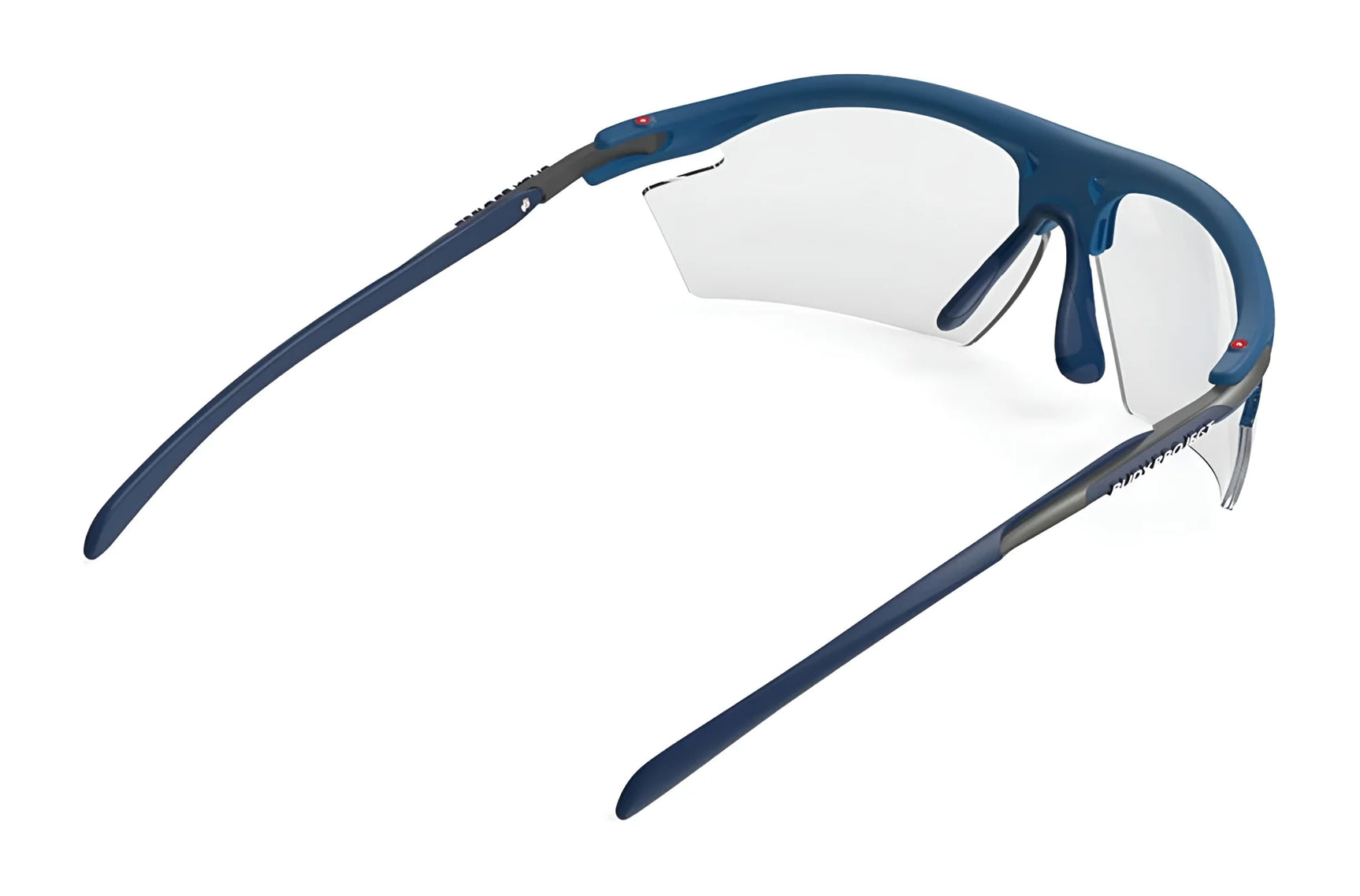 Rudy Project Rydon Sunglasses by Rudy Project shown from the rear on a white background, featuring blue frames, clear lenses, and adjustable anti-slip nosepads for enhanced comfort. Rudy Project Rydon Sunglasses by Rudy Project shown from the rear on a white background, featuring blue frames, clear lenses, and adjustable anti-slip nosepads for enhanced comfort.